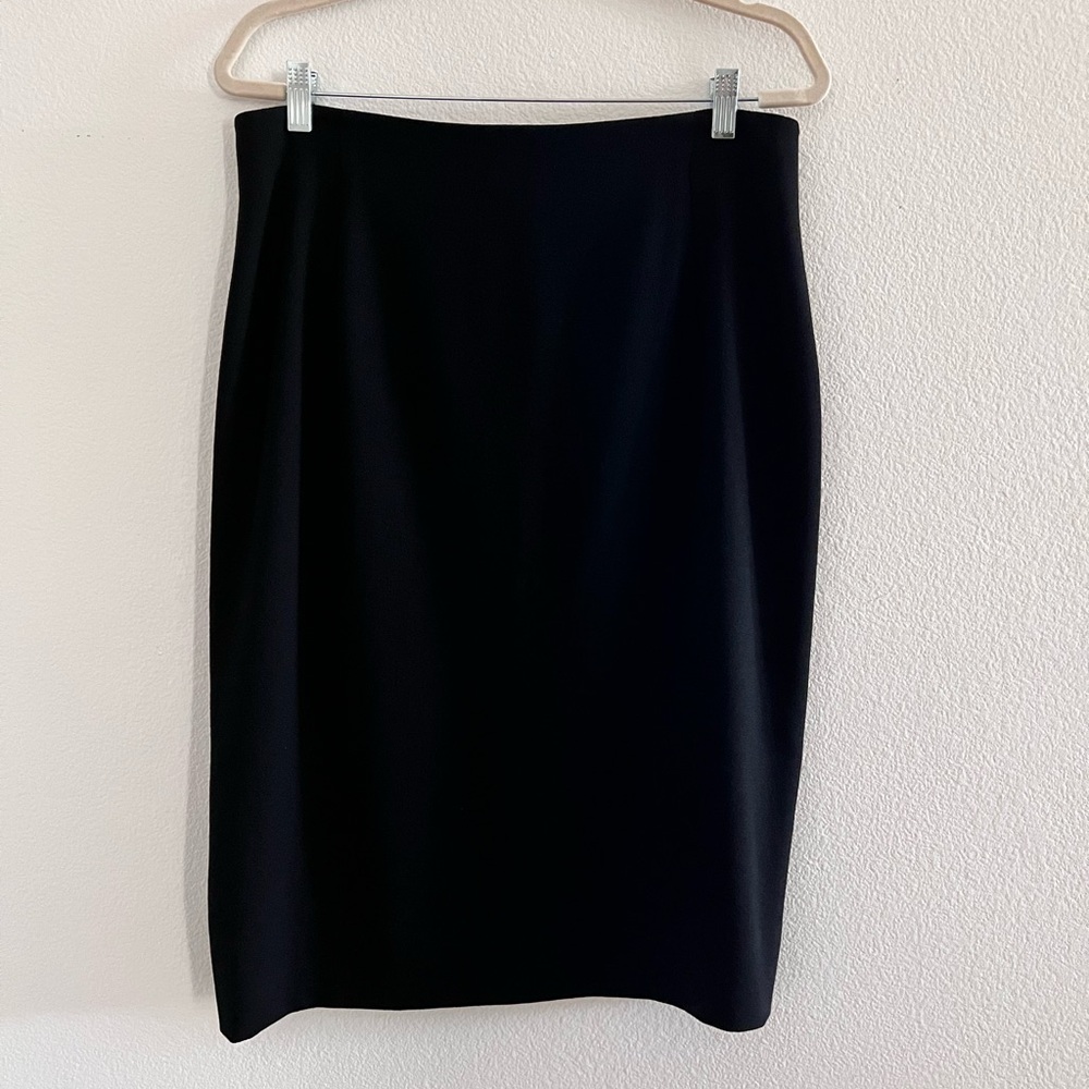 Escada black skirt with multiple slits in the back size 44